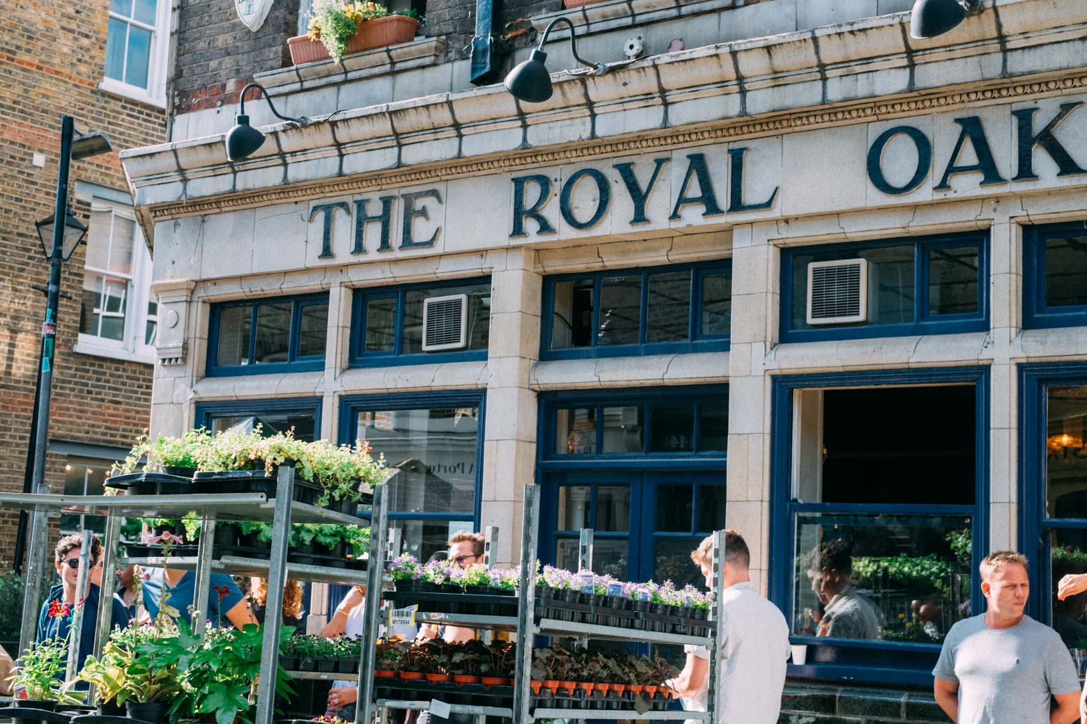 Travel tips for a packed weekend in London -- what to see and do in central London, Soho, and Shoreditch. Sunflowers at the Columbia Road Flower Market in London