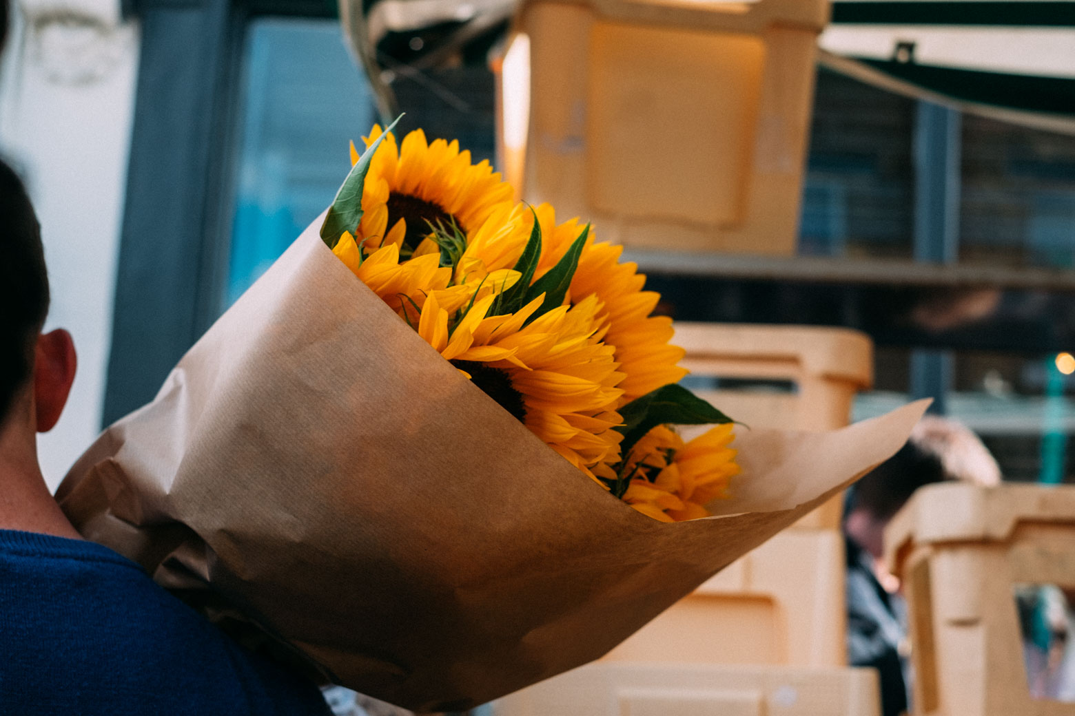 Travel tips for a packed weekend in London -- what to see and do in central London, Soho, and Shoreditch. Boquet of sunflowers at the Columbia Road Flower Market in London
