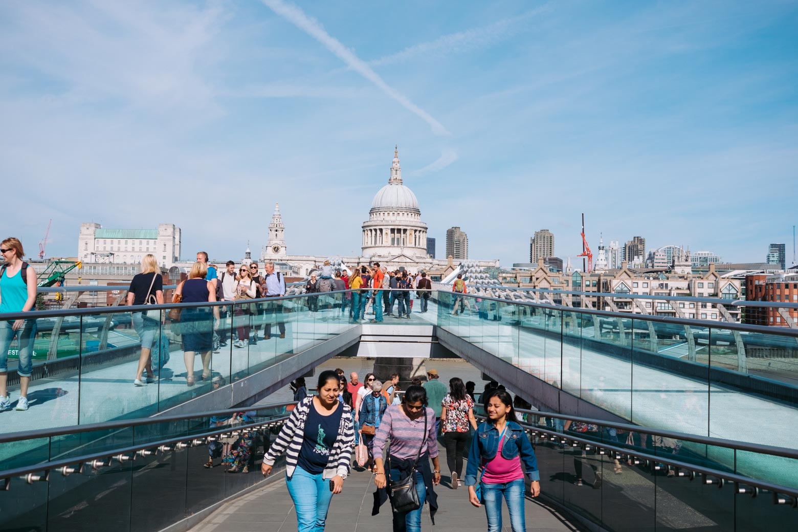 Travel tips for a packed weekend in London -- what to see and do in central London, Soho, and Shoreditch. View from across the Thames River of St. Paul's Cathedral in London
