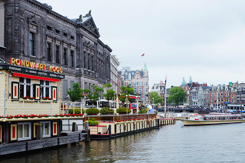 Houses, boats, and canals of Amsterdam Houses, boats, and canals of Amsterdam