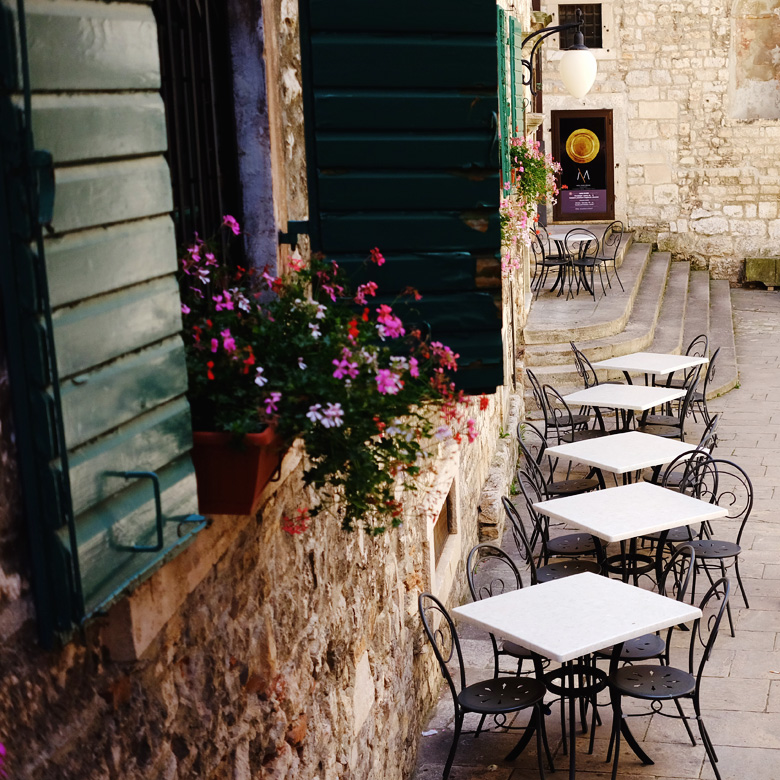 A hidden patio in Šibenik, Croatia. A hidden patio in Šibenik, Croatia.
