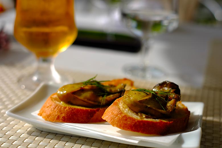 Oyster bruschetta at an italian restaurant in Hiroshima, a city famous for oysters which also hosts a series of annual oyster festivals every winter. Oyster bruschetta at an italian restaurant in Hiroshima, a city famous for oysters which also hosts a series of annual oyster festivals every winter.