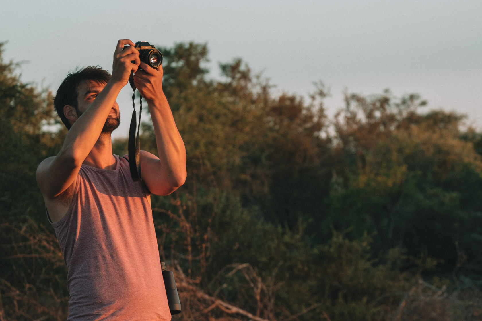 Man taking photo on safari