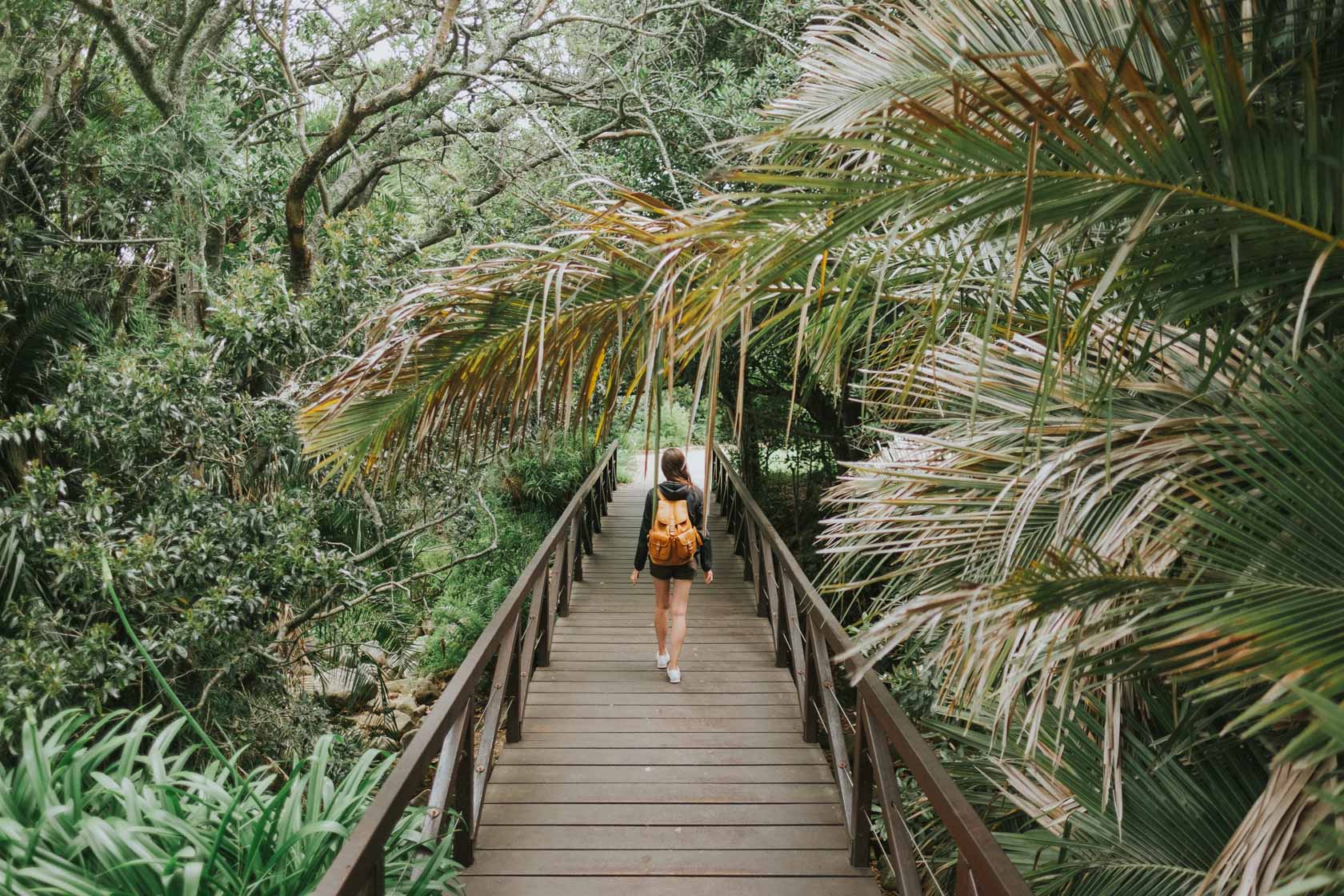 Girl with camera backpack